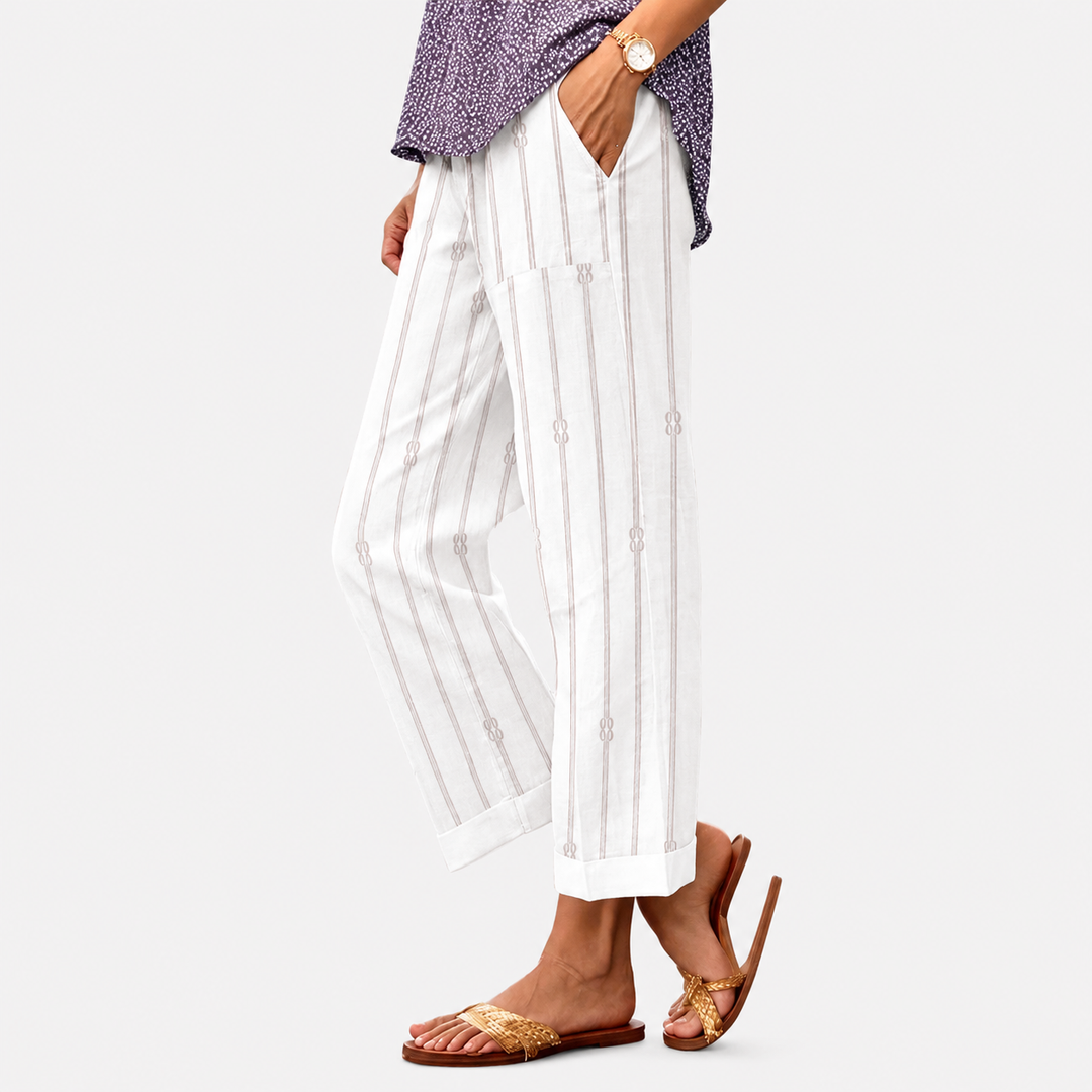 Emma | Helle Sommerhose mit rotem Blütenmuster