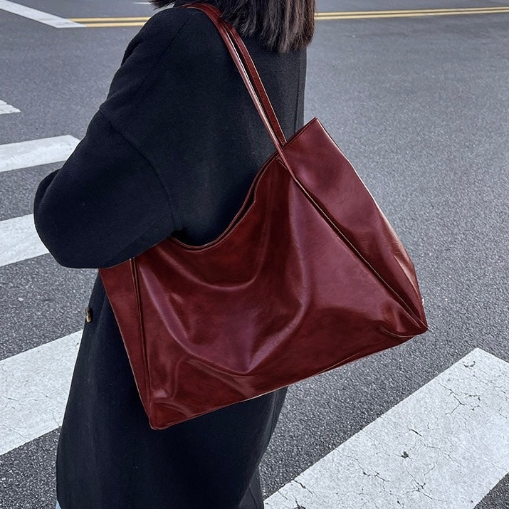 Patricia | Glänzende Lederhandtasche