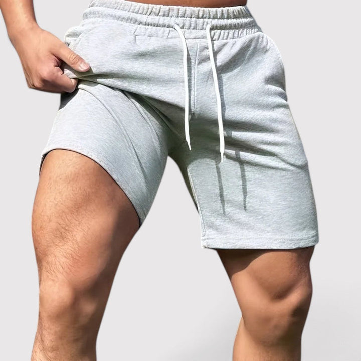 Thees™ | Dehnbare Fitness-Shorts mit Seitentaschen