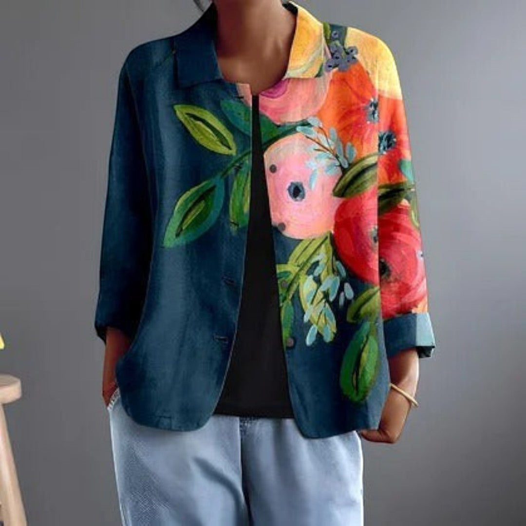 Blusa Lars Hamburg Persephone em azul-petróleo com estampa floral pintada à mão em tons de coral e verde