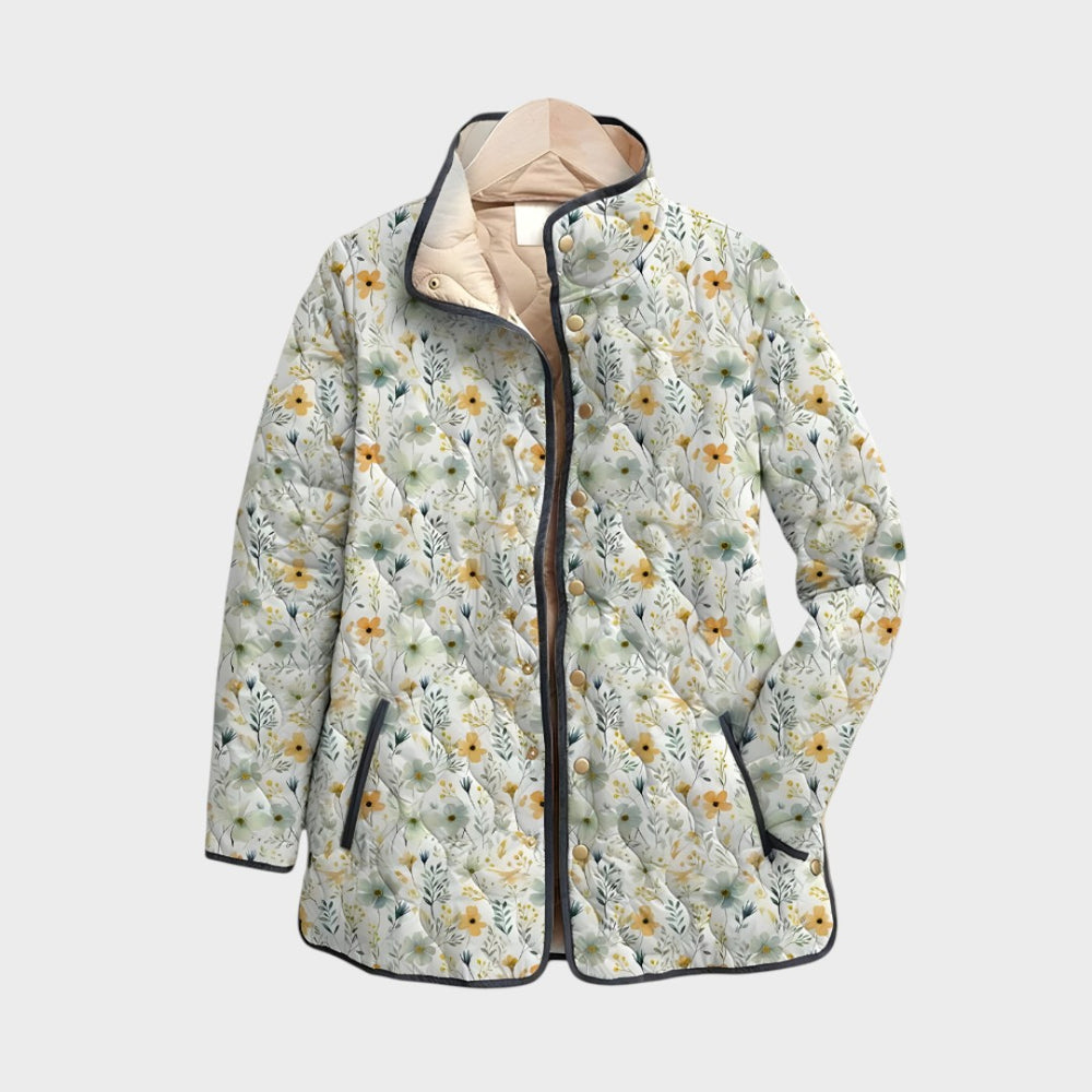 Casaco acolchoado Lars Hamburg Hattie com padrão floral delicado em tons de amarelo e verde sobre fundo claro.