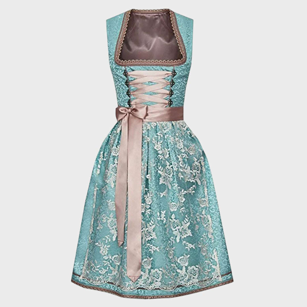 Dirndl Lars Hamburg Gretl em turquesa e rosa com bordados florais, decote quadrado, corpete com laço e avental acetinado.