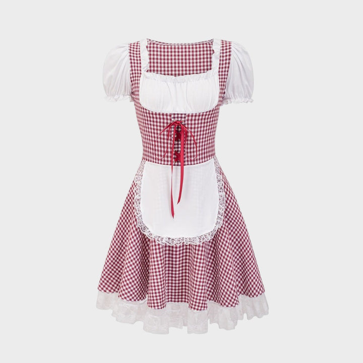 Dirndl Zita da Lars Hamburg com padrão xadrez vermelho e branco, mangas bufantes, avental e detalhes em renda.