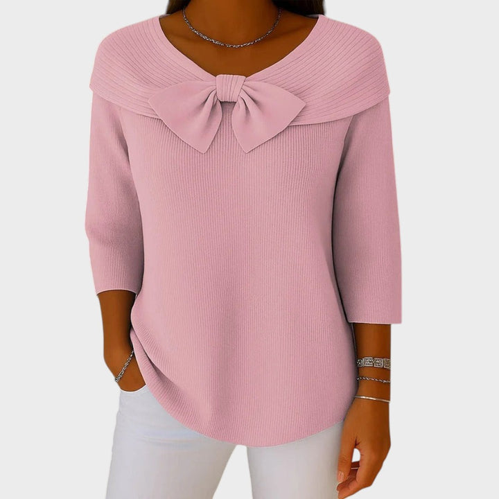 Pullover rosa Lars Hamburg com decote canoa, detalhe de laço frontal e mangas três quartos, estilo elegante e justo.