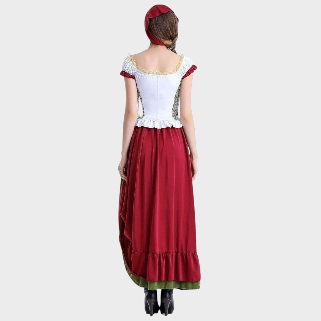 Vista traseira do traje tradicional Trudi da Lars Hamburg com corpete branco, saia vermelha e chapéu a condizer