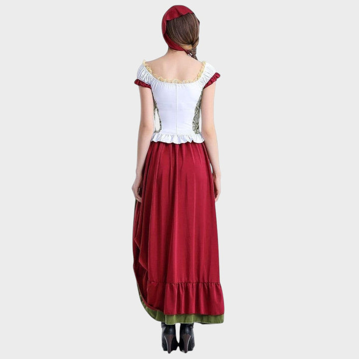 Vista traseira do traje tradicional Trudi da Lars Hamburg com corpete branco, saia vermelha e chapéu a condizer