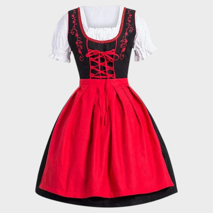 Vestido Dirndl tradicional da Lars Hamburg em preto e vermelho com blusa branca, bordados e laço frontal.