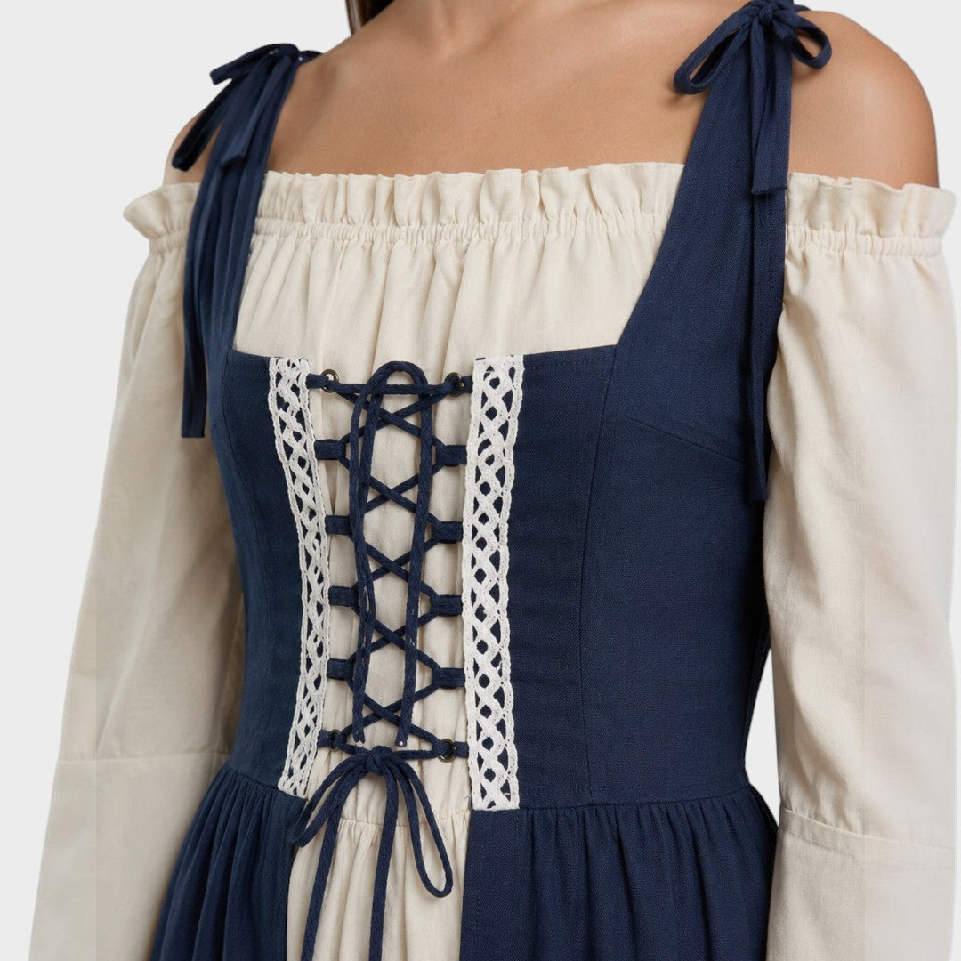 Vestido medieval Lars Hamburg azul e bege com corpete de atacadores, mangas compridas e decote franzido.