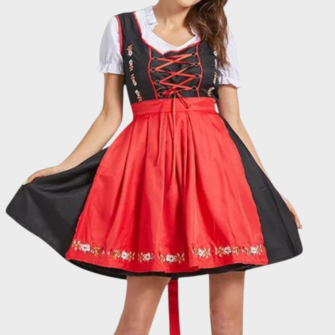 Vestido tradicional Lars Hamburg Rosl com corpete preto, avental vermelho e detalhes bordados florais elegantes.