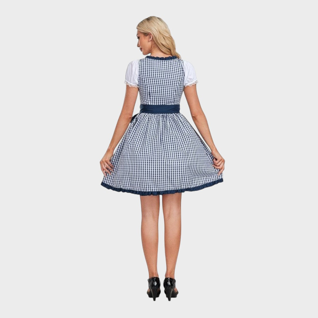 Vista traseira do vestido tradicional Lars Hamburg Mariandl com padrão xadrez azul e branco e detalhes de folhos.