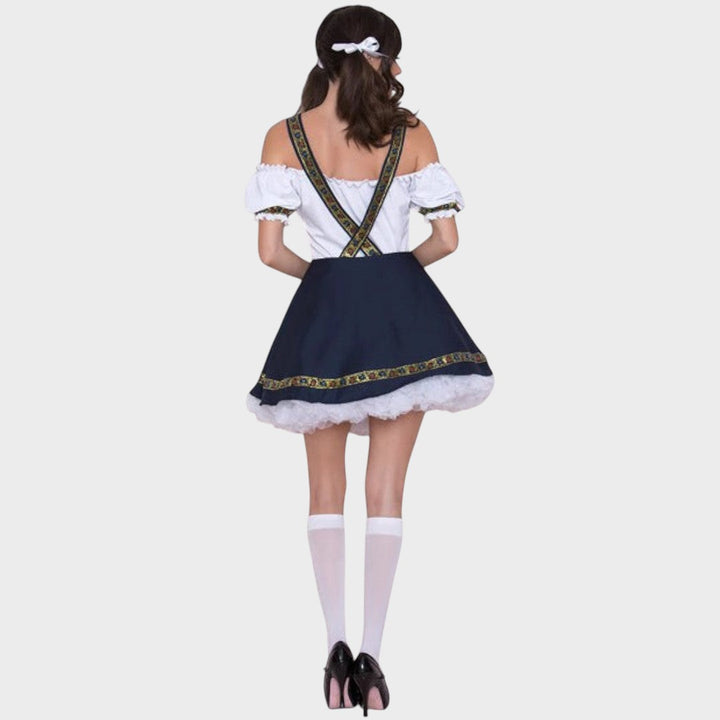 Vista traseira do vestido tradicional Trachtenkleid da Lars Hamburg, azul e branco com bordados e saia rodada.